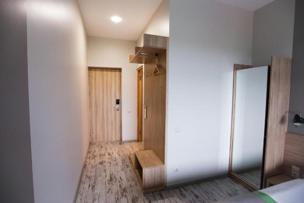 Postel nebo postele na pokoji v ubytování Hotel Vesna