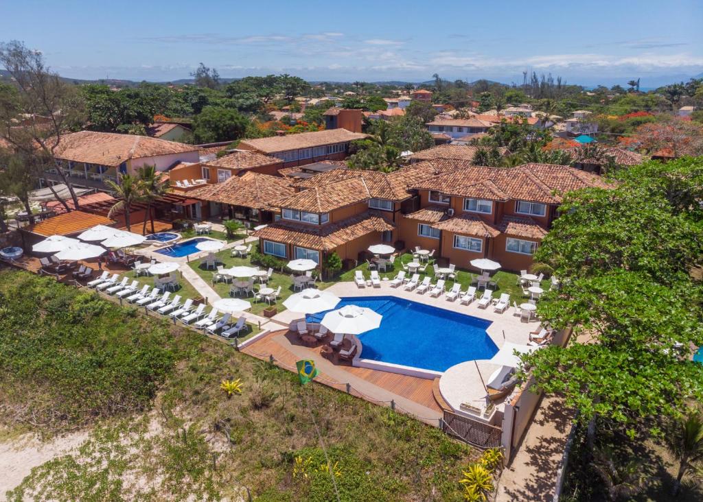 an aerial view of a resort with a swimming pool at Le Relais La Borie in Búzios