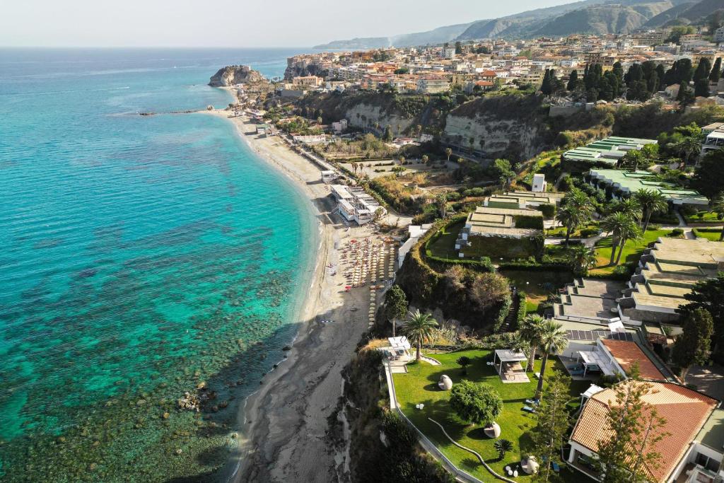 an aerial view of a beach and the ocean at Labranda Rocca Nettuno Tropea in Tropea