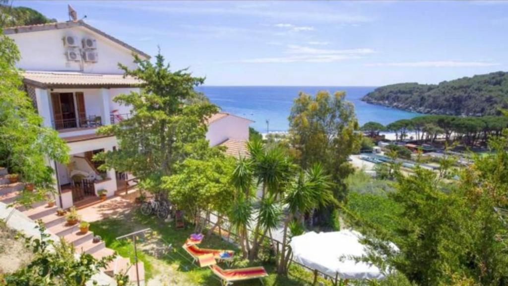 a house with a view of the ocean at Case Vacanze Maestrale in Fetovaia