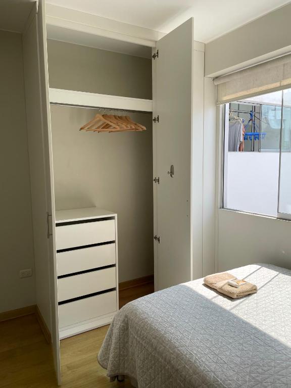 Postel nebo postele na pokoji v ubytování Departamento Compartido San Isidro