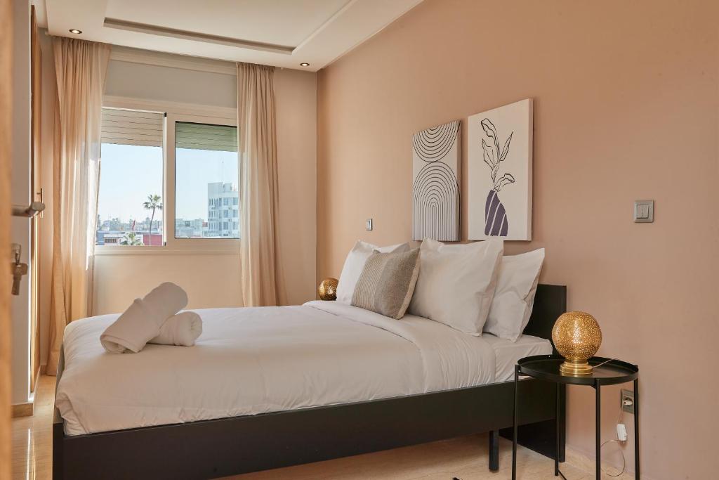 Postel nebo postele na pokoji v ubytování Stayhere Rabat - Hassan - Authentic Residence