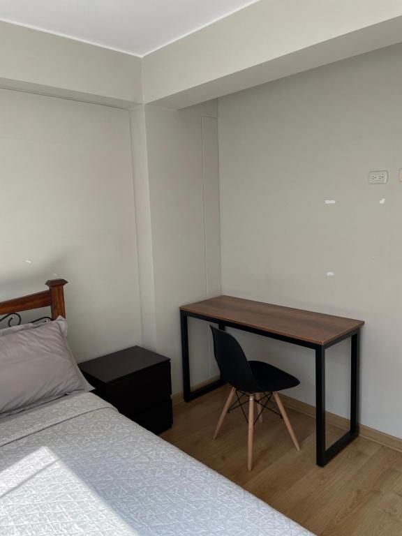 Postel nebo postele na pokoji v ubytování Departamento Compartido San Isidro