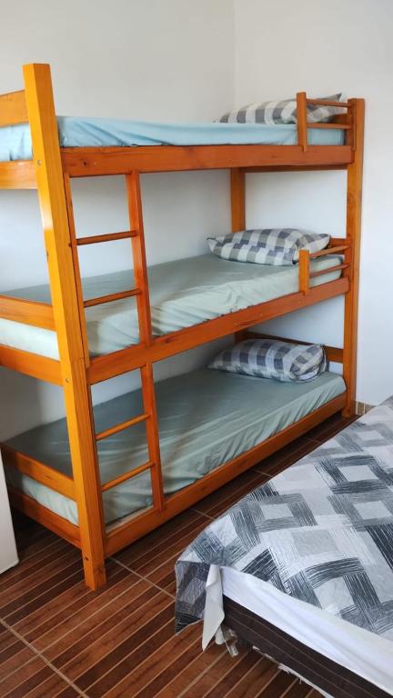 Postel nebo postele na pokoji v ubytování Pousada Do Léo