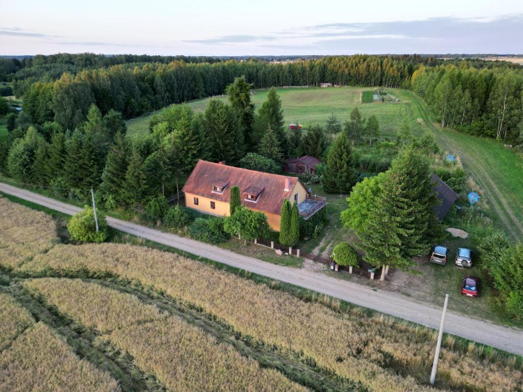 an aerial view of a house on a road at Stary Dom, a może in Kruklanki