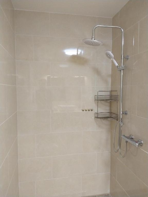 Koupelna v ubytování Gittis Condo