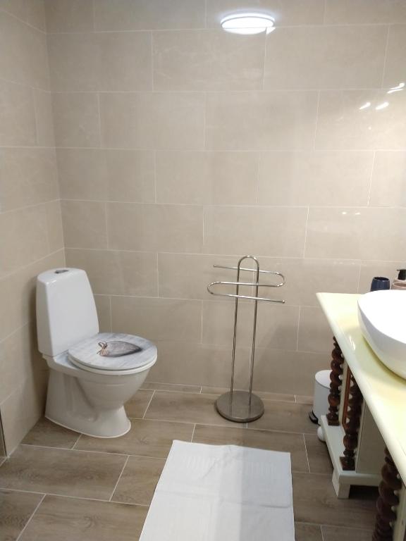 Koupelna v ubytování Gittis Condo