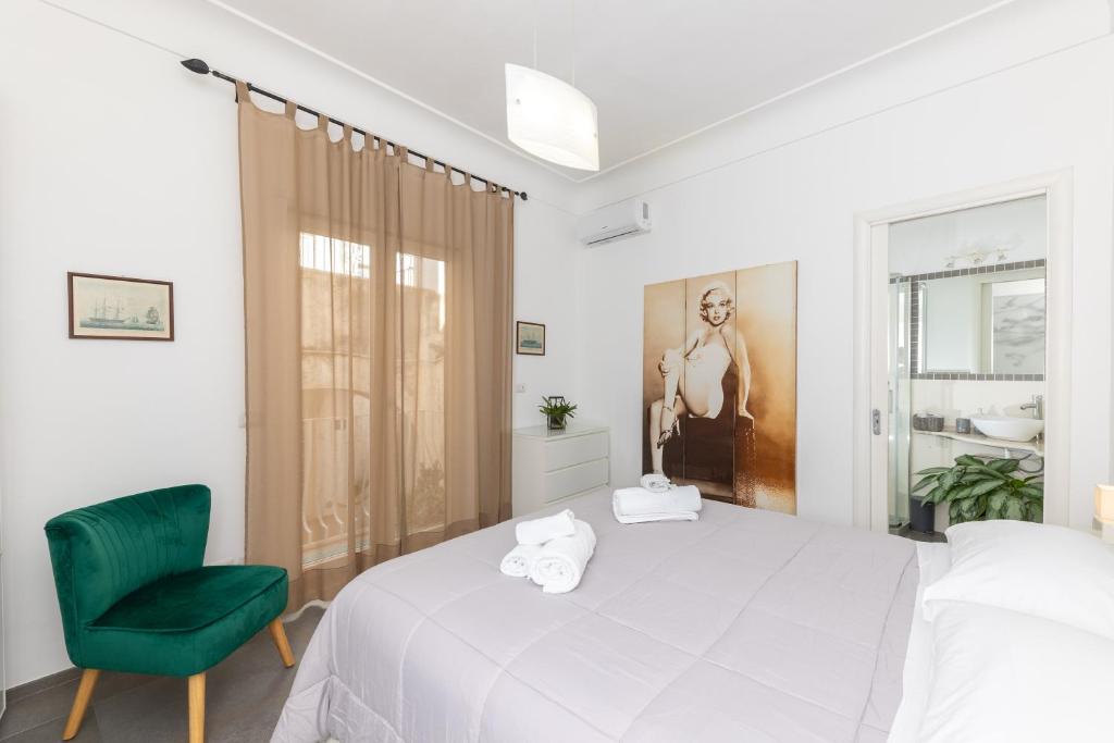 Postel nebo postele na pokoji v ubytování Casa Leucosia