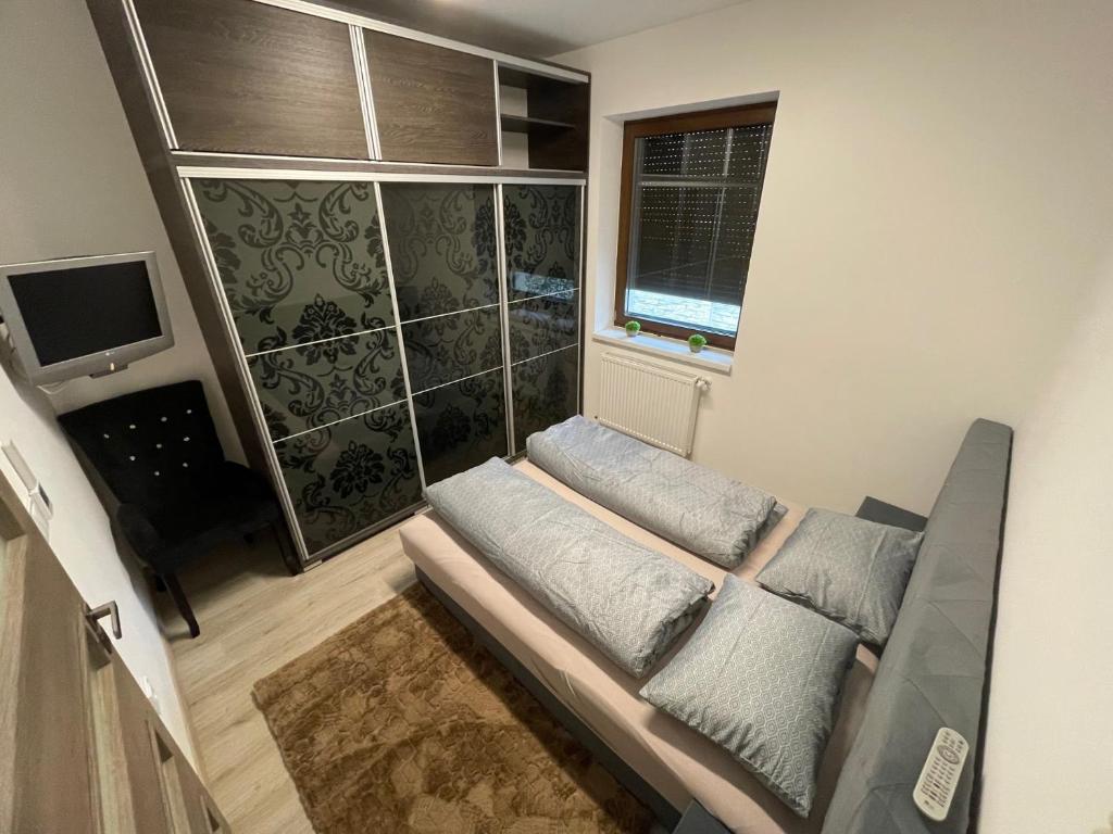 TV a/nebo společenská místnost v ubytování VRG 1 Exkluzív Apartman