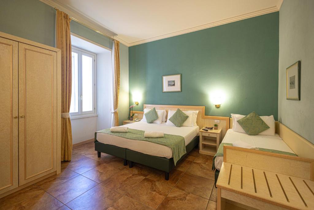Postel nebo postele na pokoji v ubytování Hotel Belvedere San Gottardo by LVG Hotel Collection