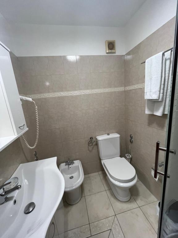 Koupelna v ubytování Rooms Base