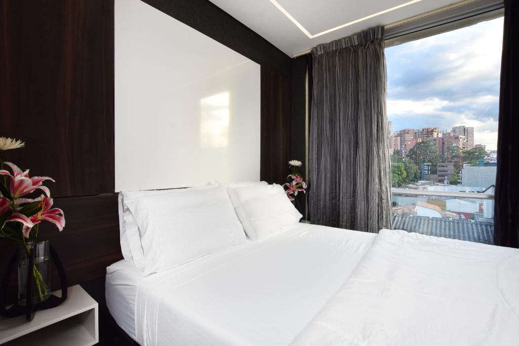 Postel nebo postele na pokoji v ubytování Haven A Design Hotel