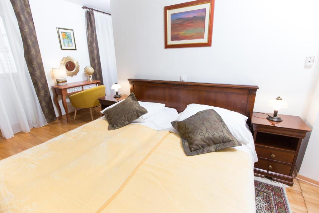 Postel nebo postele na pokoji v ubytování Rooms Base