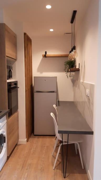 Kuchyň nebo kuchyňský kout v ubytování Porticcio- Duplex dans propriété privée