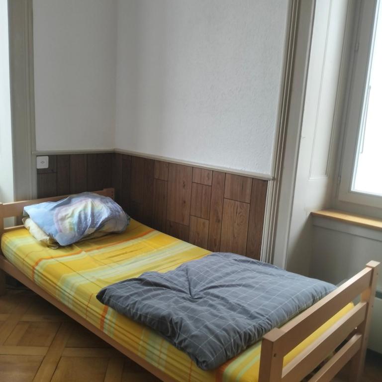 Ένα ή περισσότερα κρεβάτια σε δωμάτιο στο Guest room