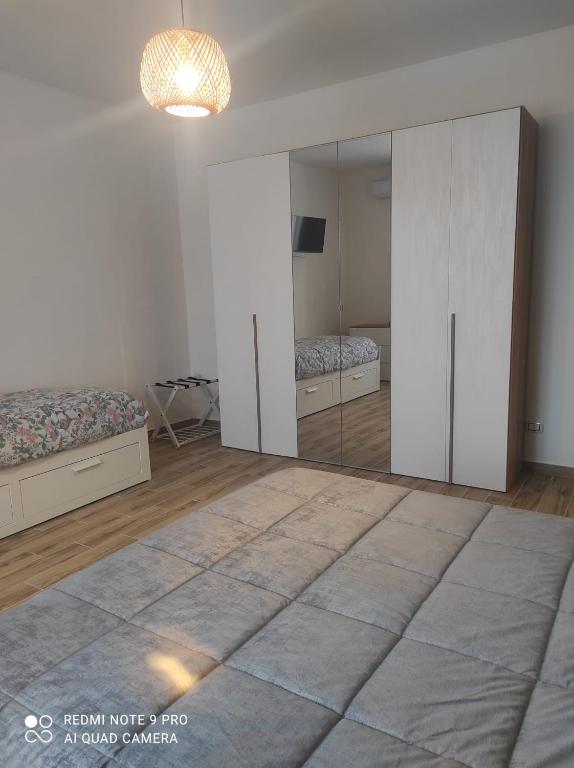 Postel nebo postele na pokoji v ubytování APPARTAMENTO JLENIA