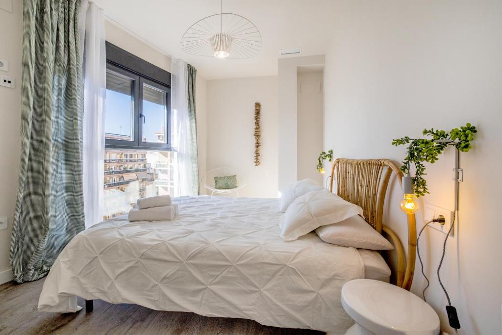 A bed or beds in a room at Costasol33 Aptos 1 y 2