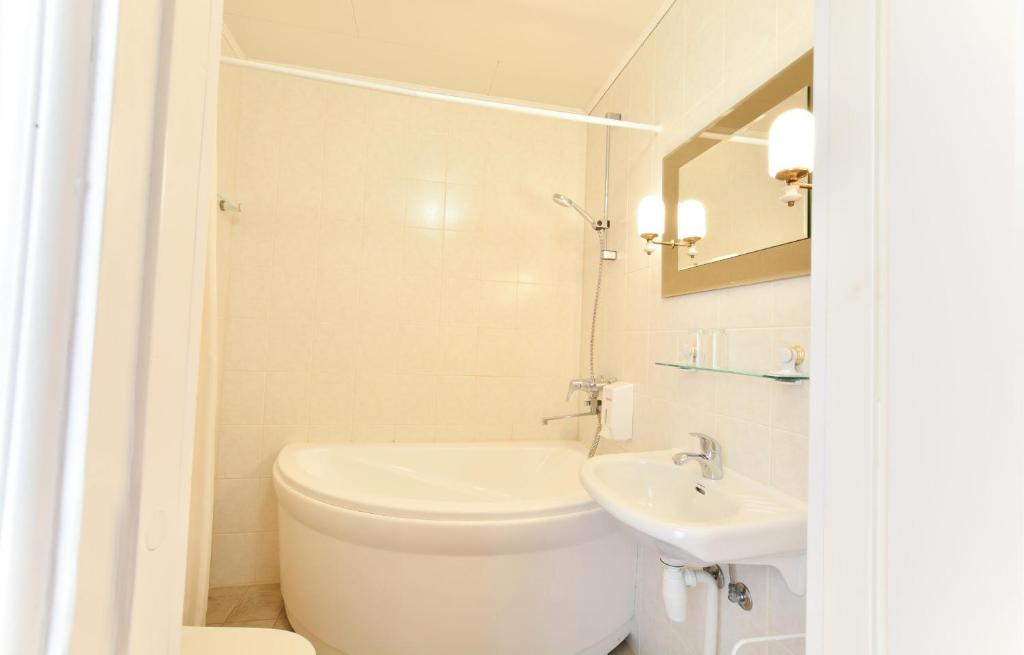Koupelna v ubytování Hotel Promenaadi