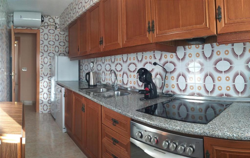 Kuchyň nebo kuchyňský kout v ubytování La Linea