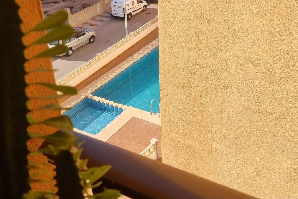 Bazén v ubytování Coqueto Apartamento en la Playa nebo v jeho okolí