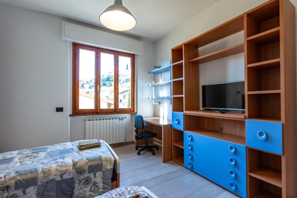 TV a/nebo společenská místnost v ubytování Accogliente casa a Pontassieve