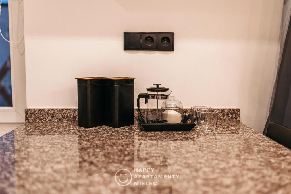 Príslušenstvo na prípravu kávy alebo čaju v ubytovaní Happy Day - ApartamentyHappy pl
