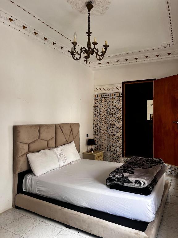Postel nebo postele na pokoji v ubytování Riad Palais D'Or