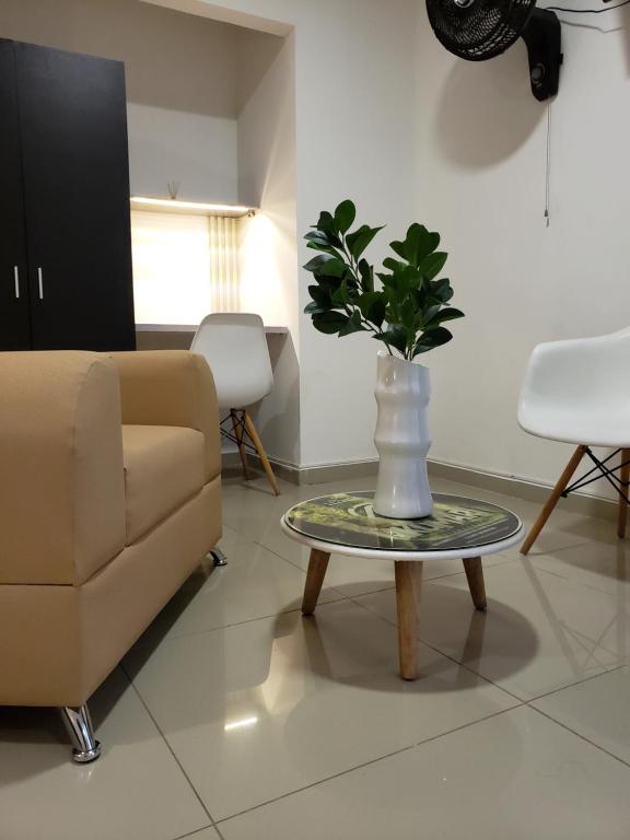 Posezení v ubytování Hotel Suite Center Pereira