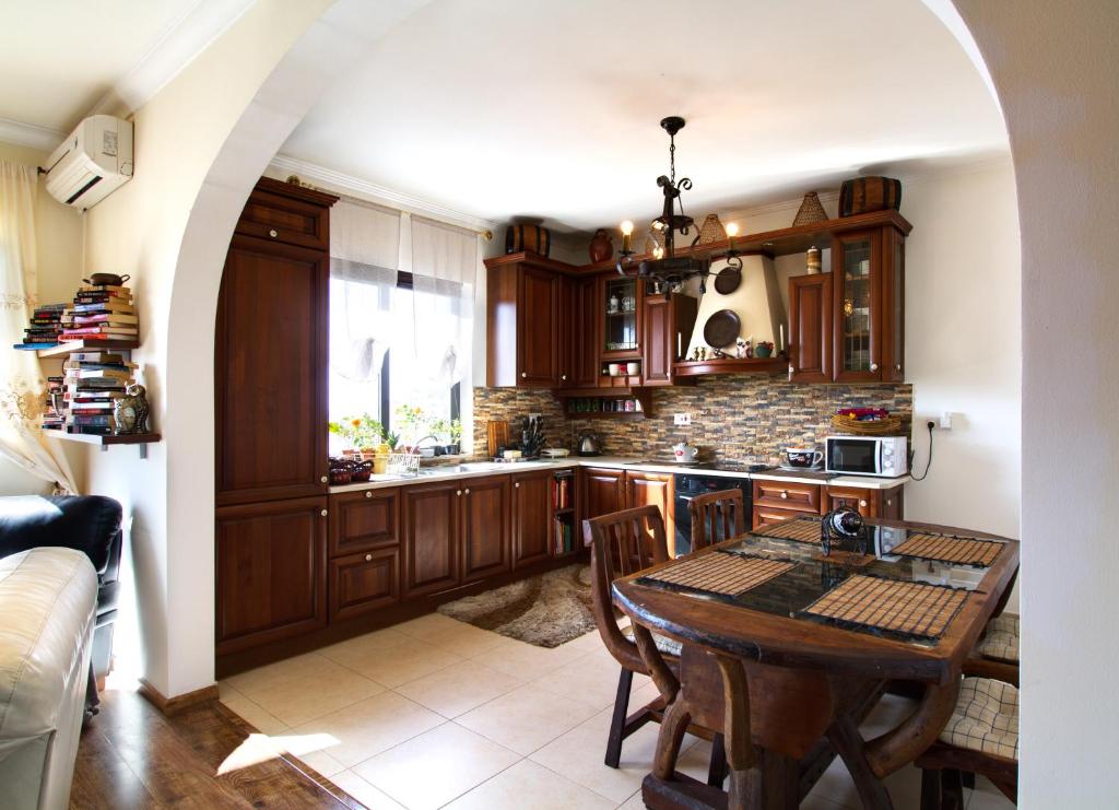 Kuchyň nebo kuchyňský kout v ubytování Sunshine Court Budget