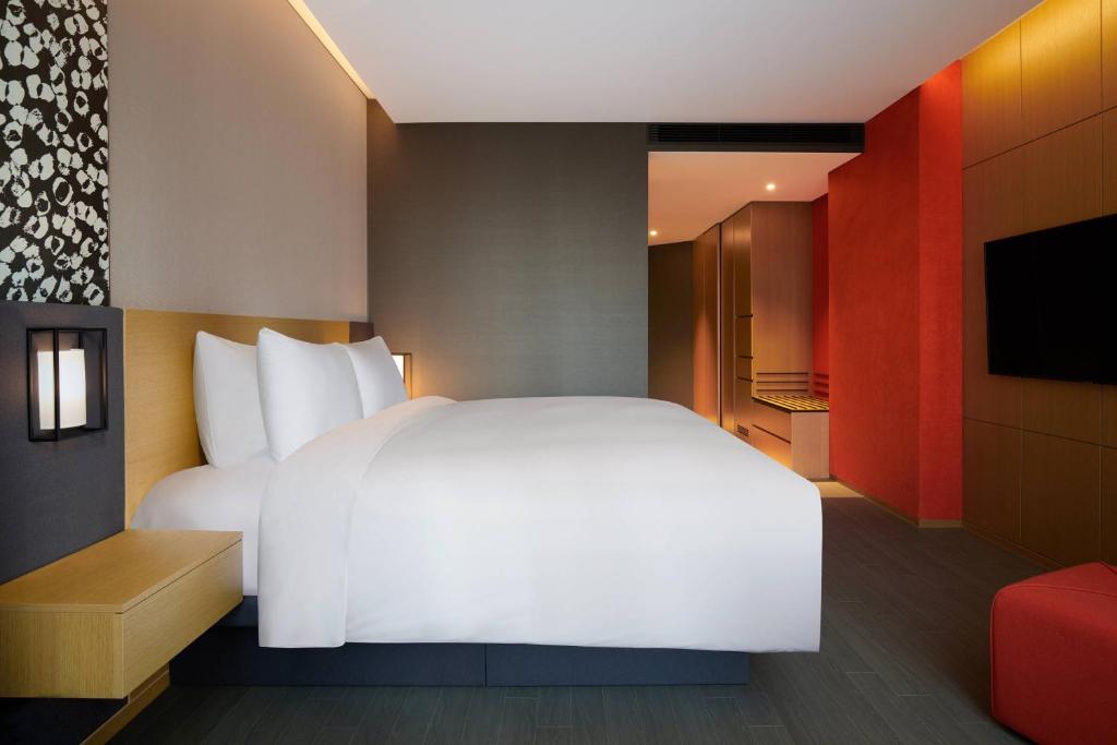 Postel nebo postele na pokoji v ubytování Courtyard by Marriott Suwon
