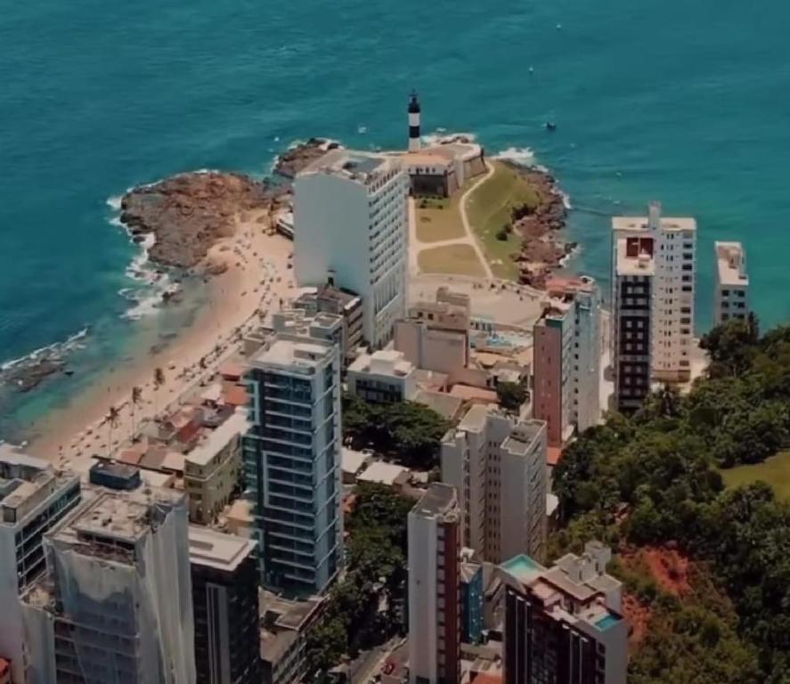 an aerial view of a city and a beach at Lindo apartamento na Barra in Salvador
