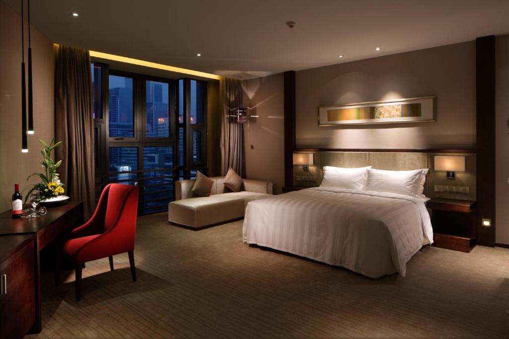 Postel nebo postele na pokoji v ubytování Lia Charlton Hotel Shenzhen