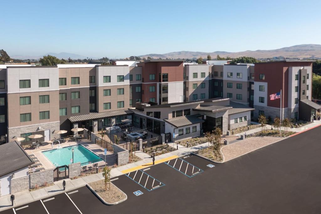 an aerial view of a building with a pool at Residence Inn by Marriott Fairfield Napa in Fairfield