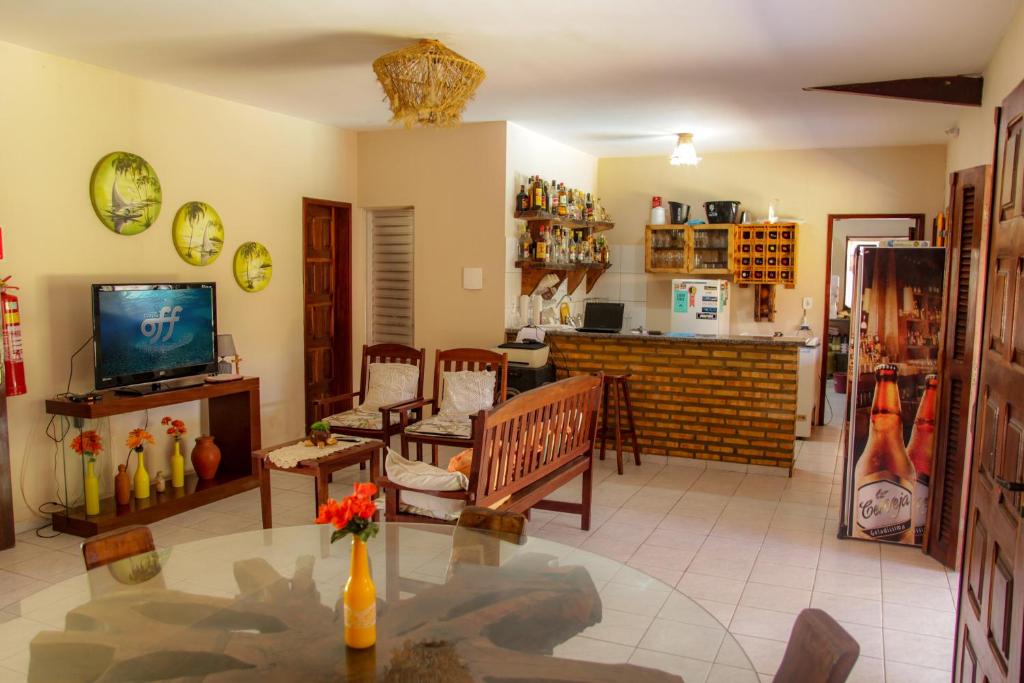 TV a/nebo společenská místnost v ubytování Pousada Vila Bella - Praia do Macapá