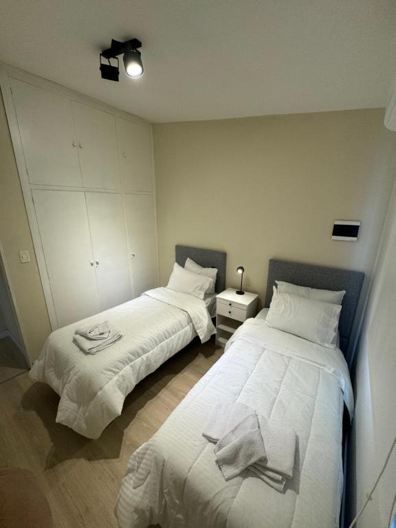מיטה או מיטות בחדר ב-Casa Del Cable Carril