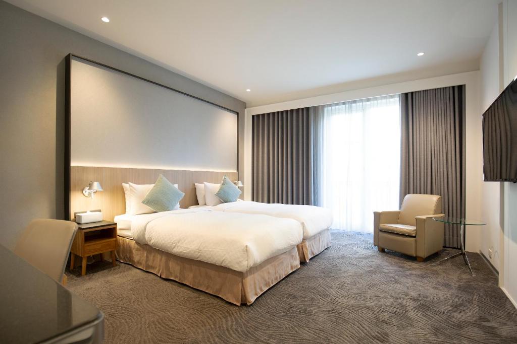 Postel nebo postele na pokoji v ubytování Dandy Hotel - Tianjin Branch