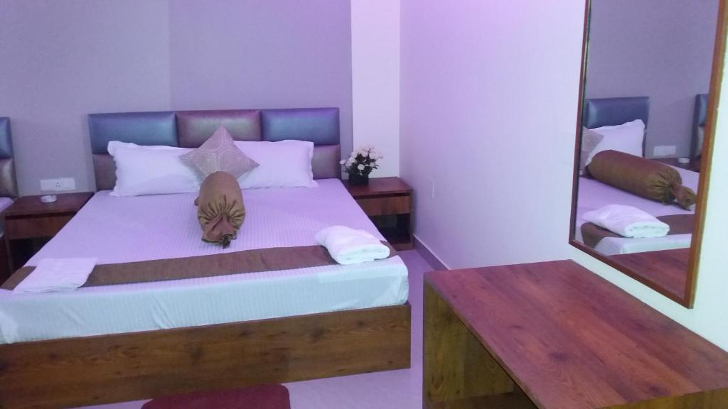 Postel nebo postele na pokoji v ubytování The Piku's Inn