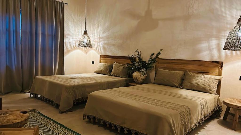 Postel nebo postele na pokoji v ubytování Casa Sílice Guesthouse