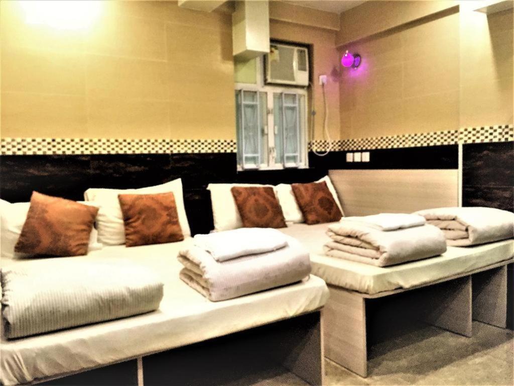 Postel nebo postele na pokoji v ubytování New Fortunate Guest House A1