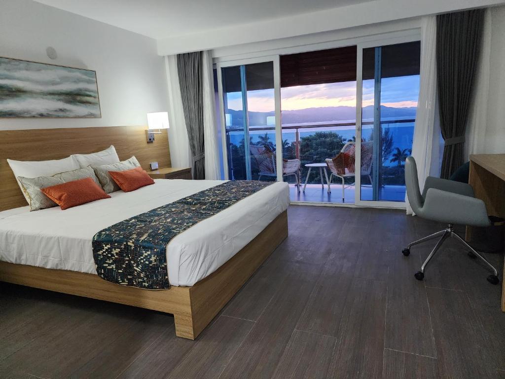 Postel nebo postele na pokoji v ubytování Hotel 39 Jamaica