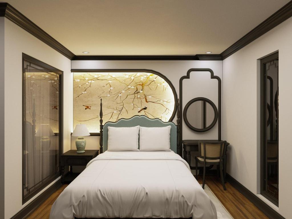 Postel nebo postele na pokoji v ubytování Aquarius Premium Hotel