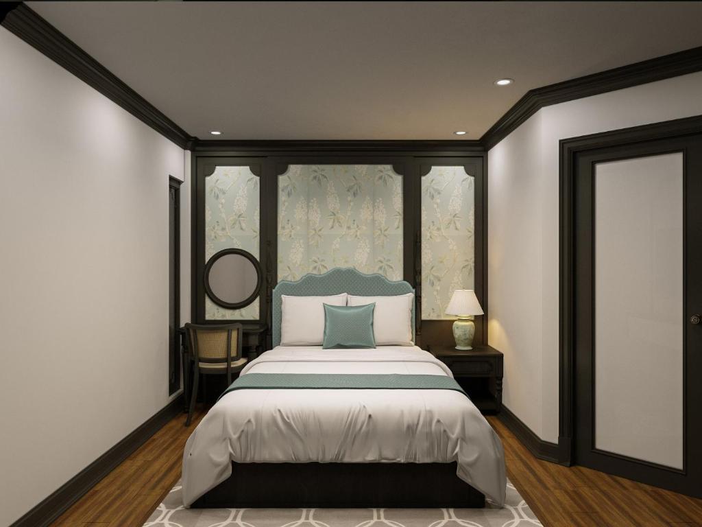Postel nebo postele na pokoji v ubytování Aquarius Premium Hotel