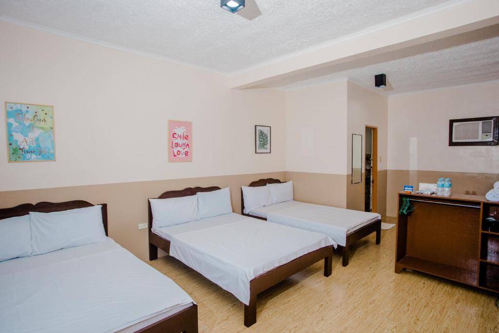 Postel nebo postele na pokoji v ubytování Durhan White Beach Resort powered by Cocotel