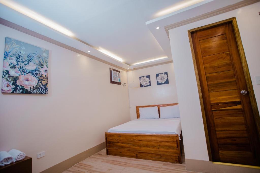 Postel nebo postele na pokoji v ubytování Durhan White Beach Resort powered by Cocotel