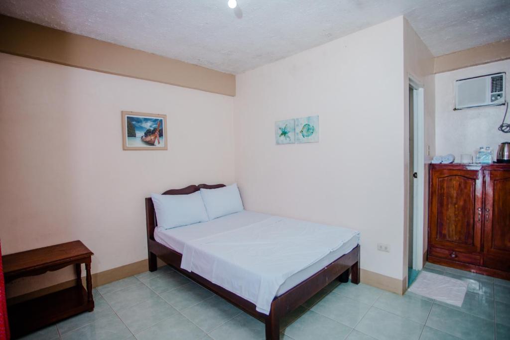 Postel nebo postele na pokoji v ubytování Durhan White Beach Resort powered by Cocotel
