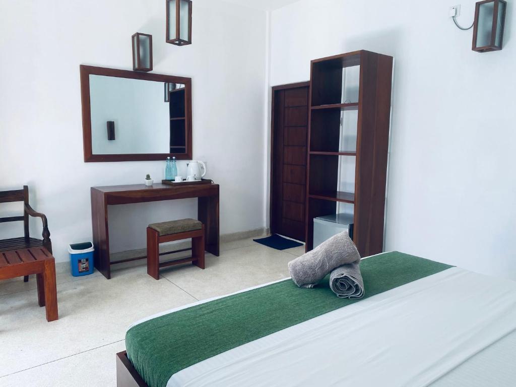 Postel nebo postele na pokoji v ubytování Bienvenido Cozy Madiha