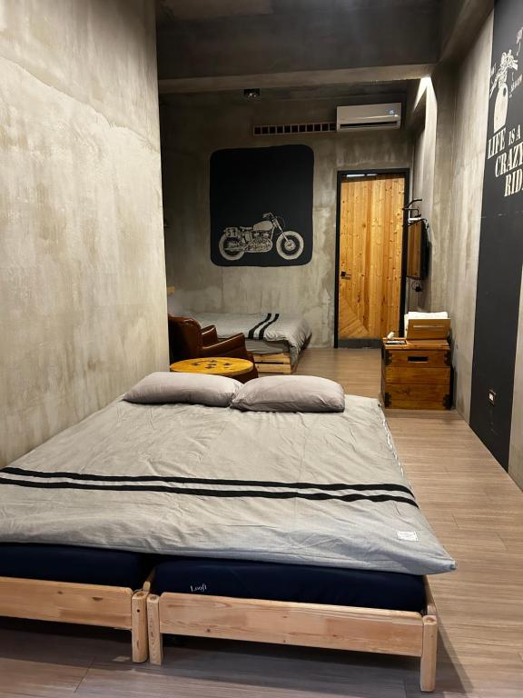 Letto o letti in una camera di 墾丁恆春包棟 l 洛夫特Looft民宿