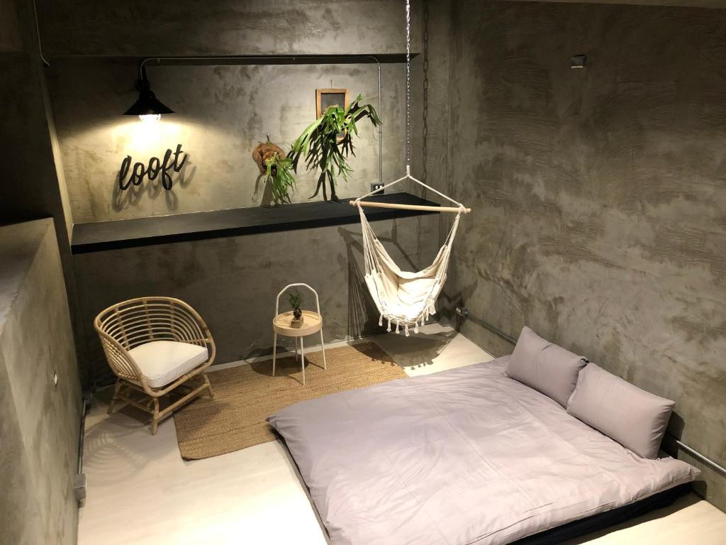 Letto o letti in una camera di 墾丁恆春包棟 l 洛夫特Looft民宿