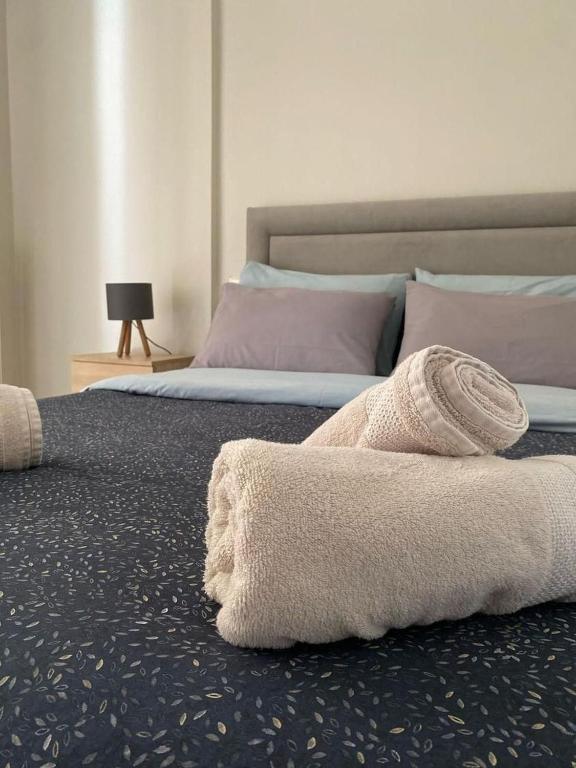 A bed or beds in a room at Guest-home 2