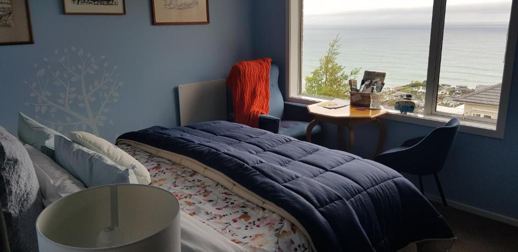 Postel nebo postele na pokoji v ubytování Rosemount B&B by the Sea St Clair